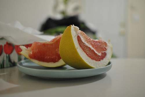 citrus fruit sliced ponkan fruits on plate grapefruit